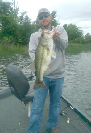 Brandon Book with a trophy bass caught while fishing with Lake Fork Guide Gary Long